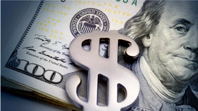 Wall St holds gains as Fed keeps rates