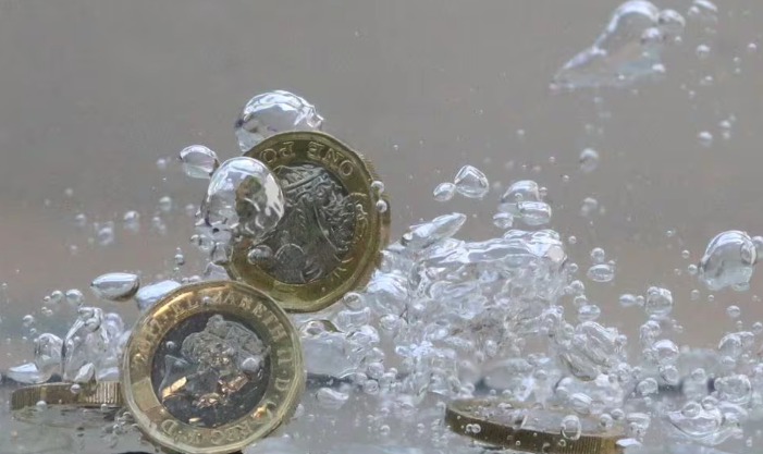 Sterling Little Changed Ahead of US Economic Data