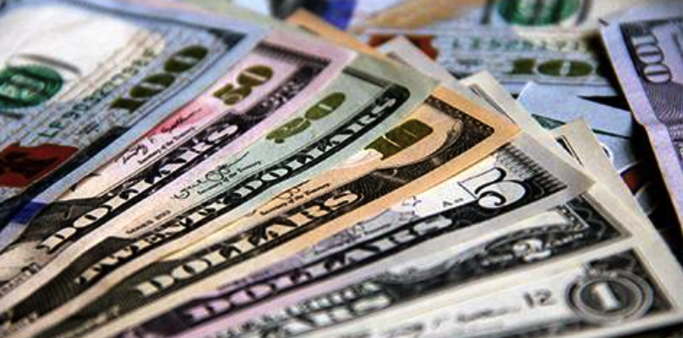 Dollar Hovers Near Three-Week Trough Ahead of US Inflation Data
