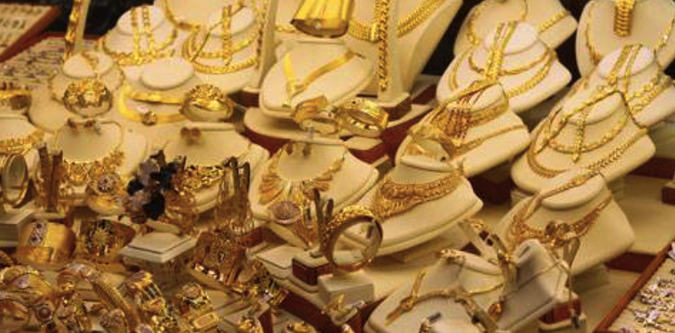 Gold's Weekly Loss Amidst Dollar Surge and Economic Data